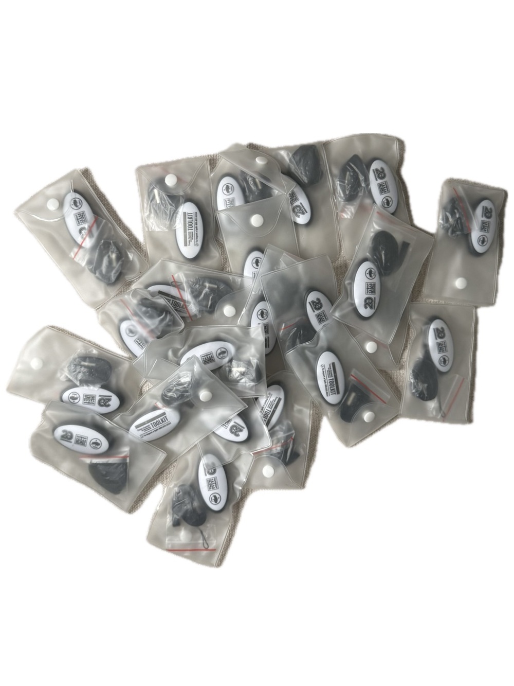 Pack of White Electronic Security Tags with Black Accessories